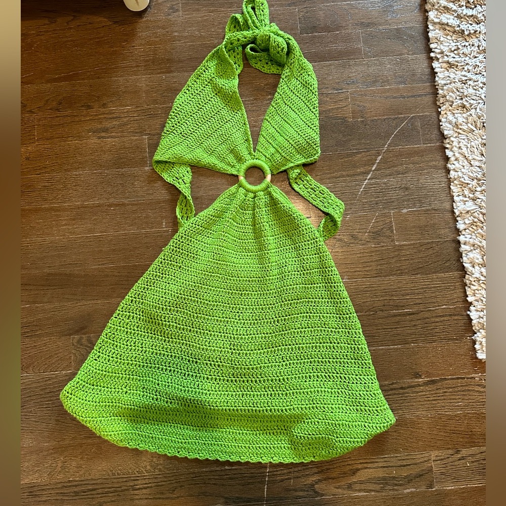 - Green crotchet mini dress from Beginning Boutique
